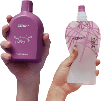 Two hands holding Zero Co bottles'
